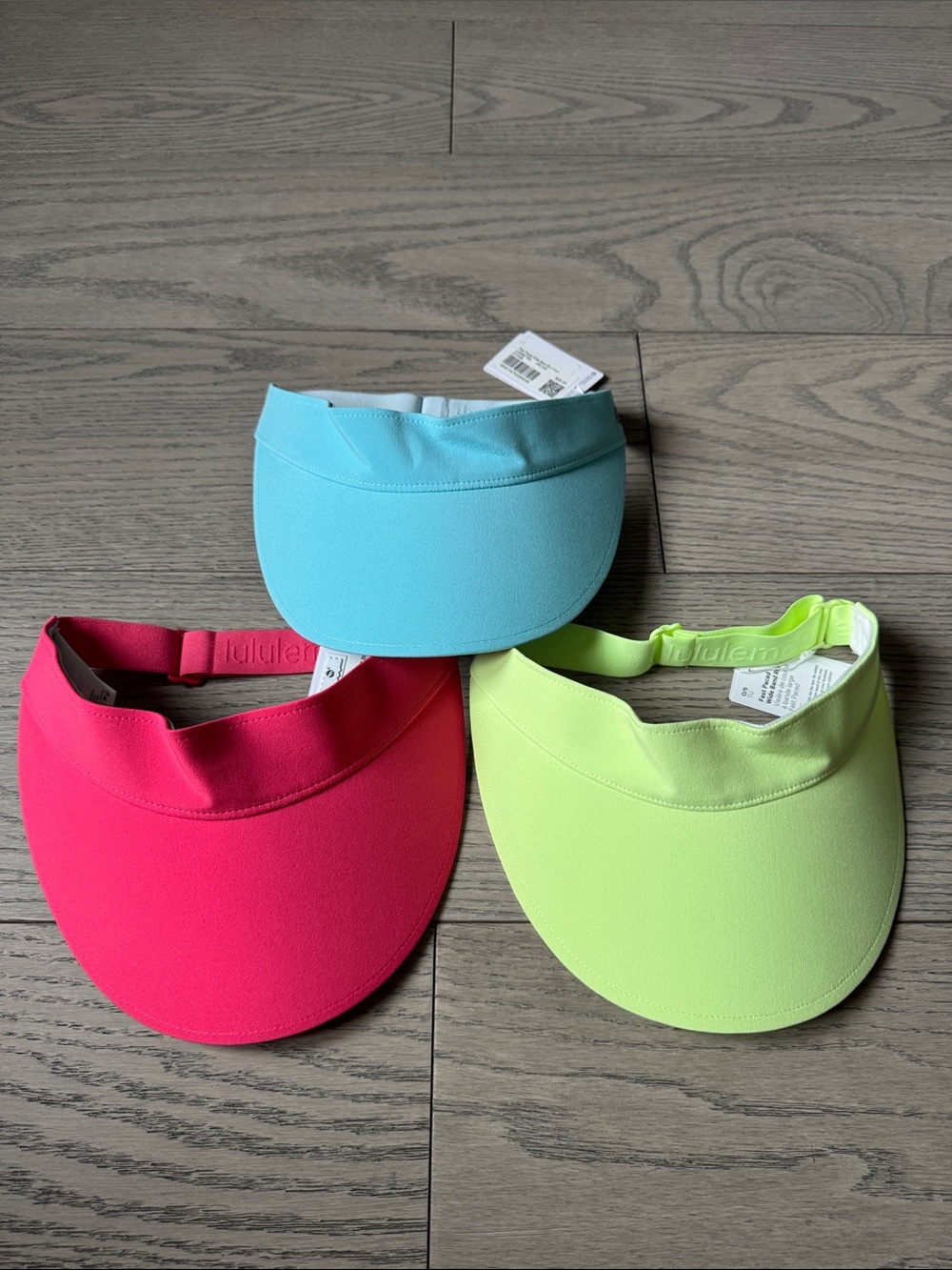 lululemon athletica Neon Visor Trio - Hot Pink, Aqua, Lime Green